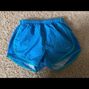 Blue patterned Nike Athletic Shorts. Size small